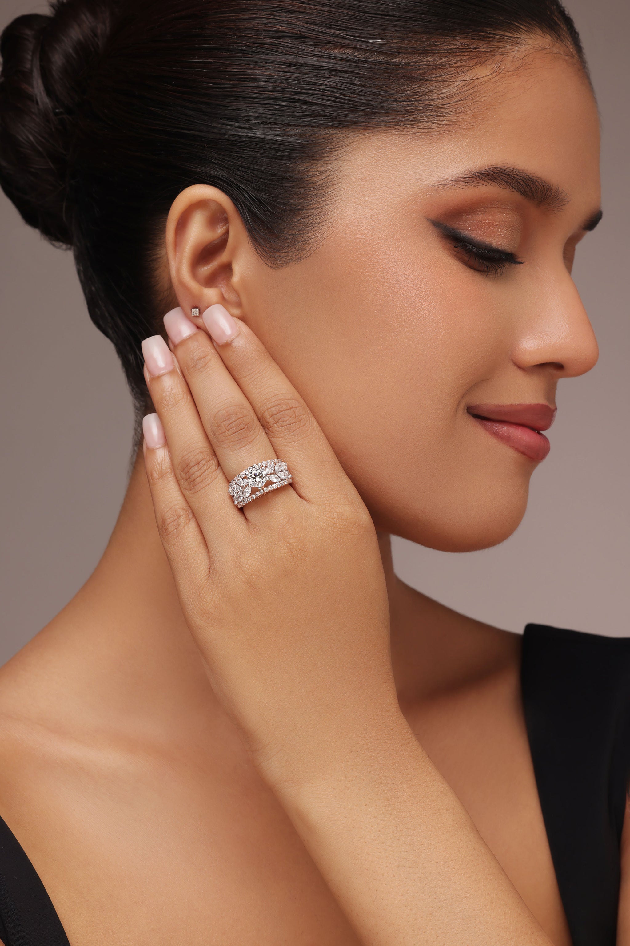 Round Brilliant Solitaire in Six-Prong Marquise Band