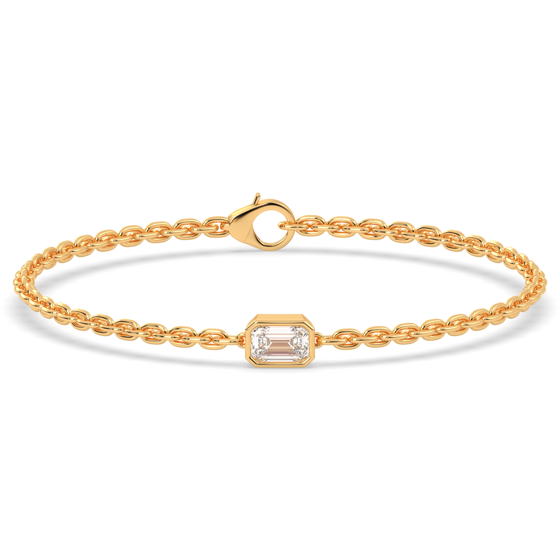 A yellow gold chain bracelet with a single, horizontally set emerald cut lab grown diamond in it at the center, secured by a clasp.