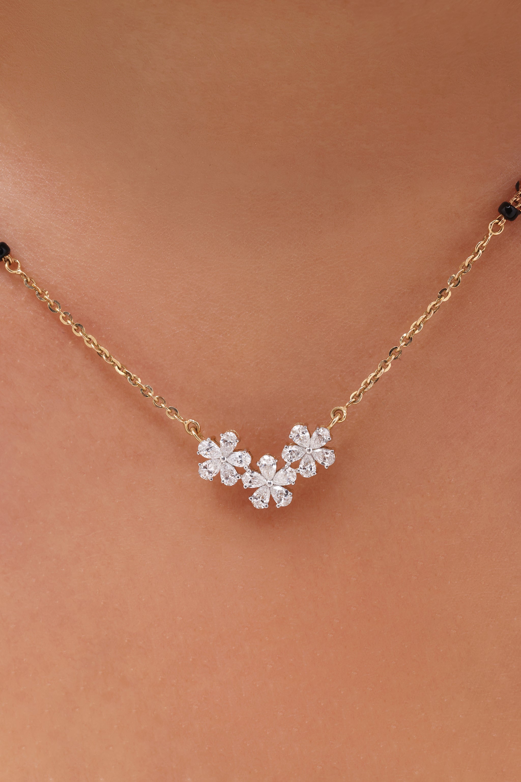 Pear Shaped Floral Diamond Tanmaniya