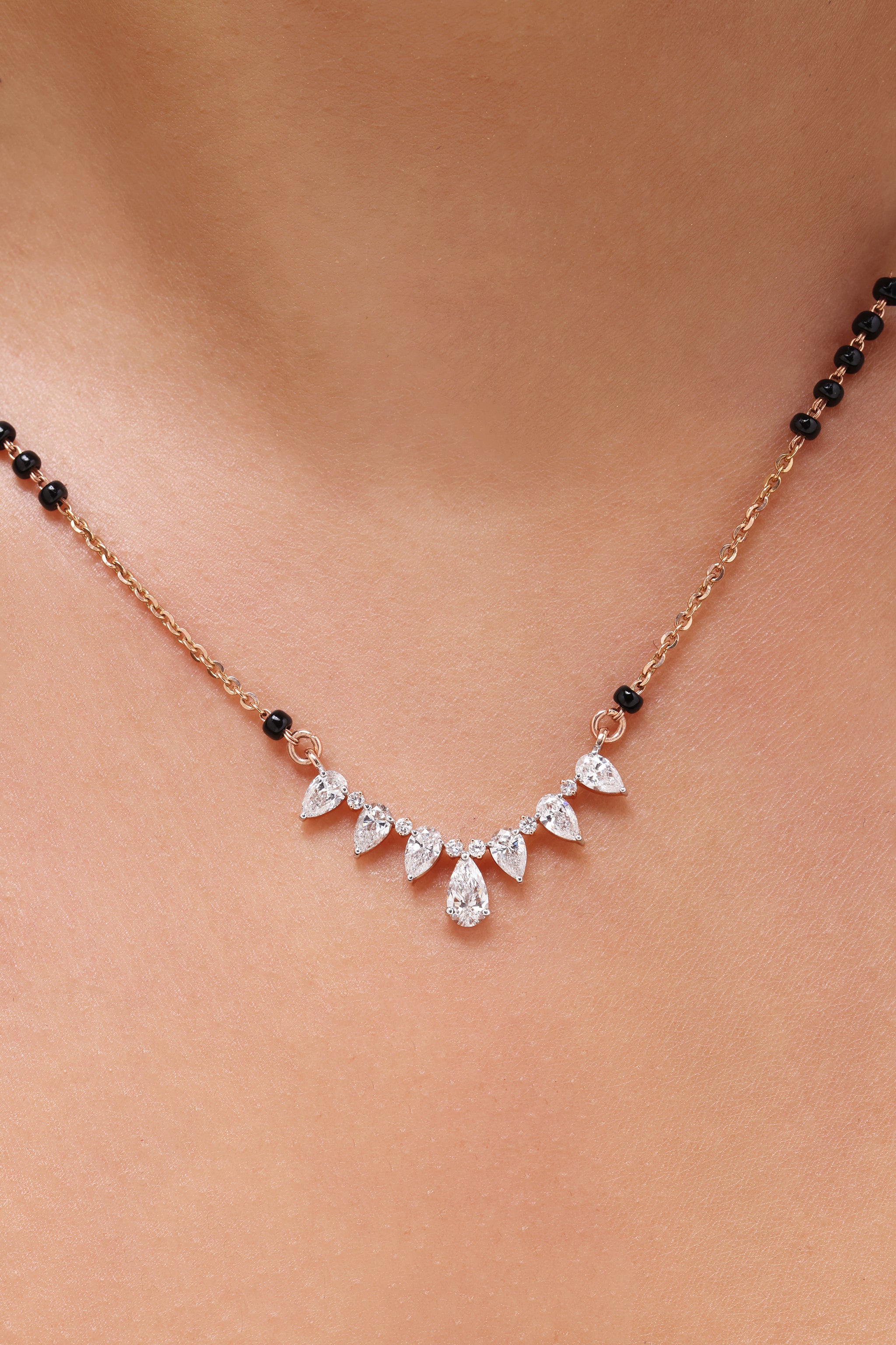 Pear and Round Diamond Tanmaniya