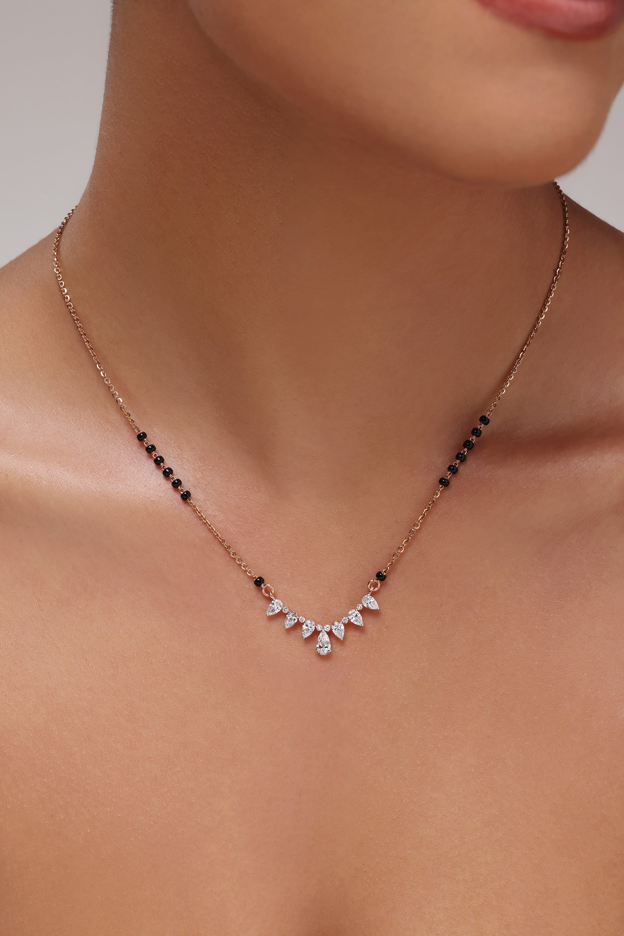 Pear and Round Diamond Tanmaniya