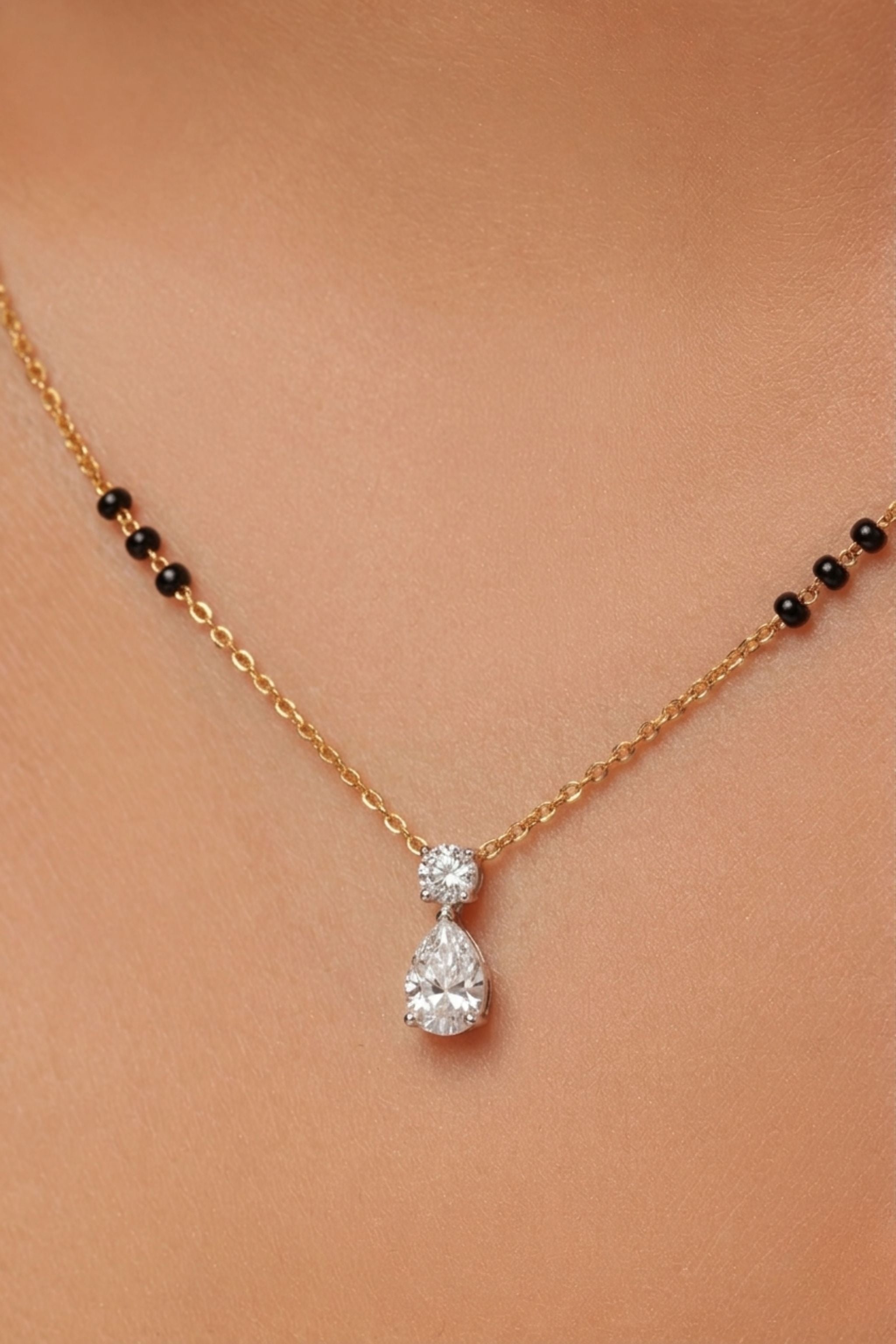 Pear and Round Diamond Tanmaniya