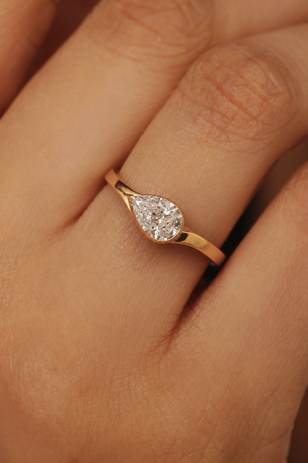 The Dainty Pear Solitaire Ring