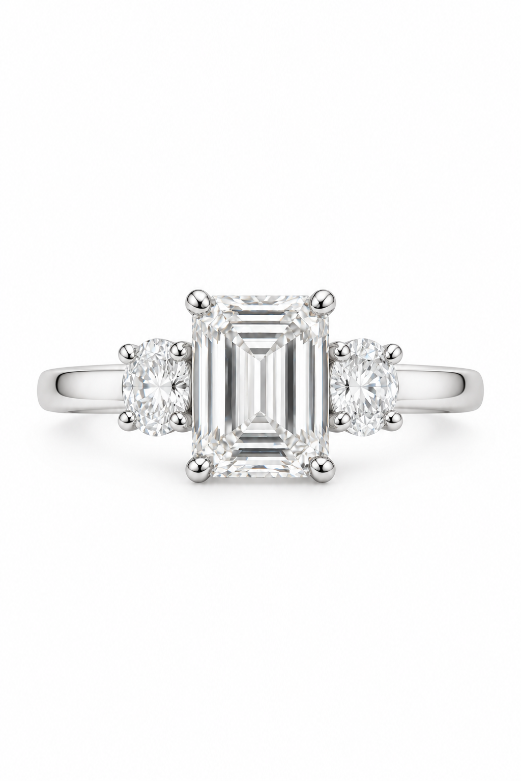Emerald Cut With Oval Side Stones Ring