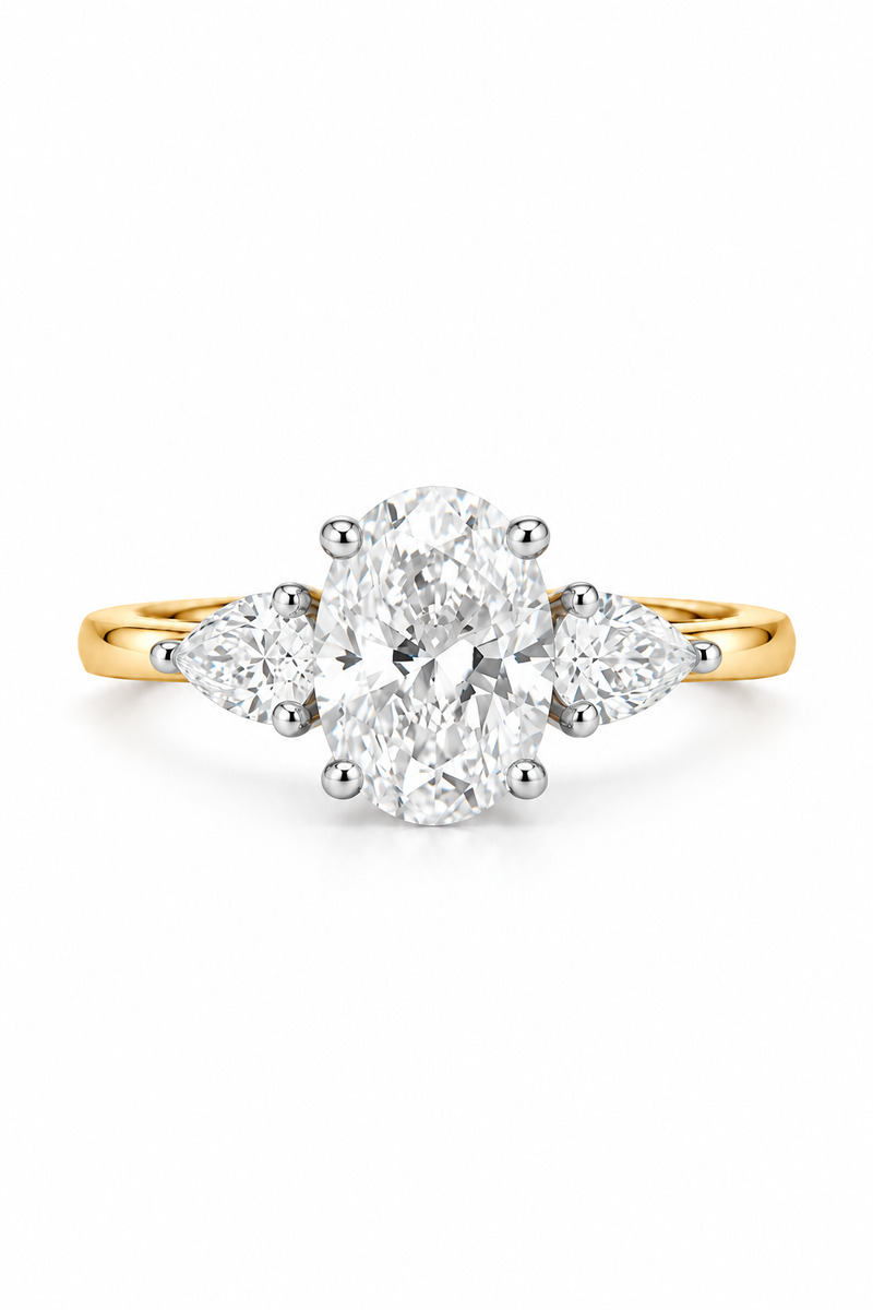 Oval-Cut Diamond Ring With Pear Side Stones