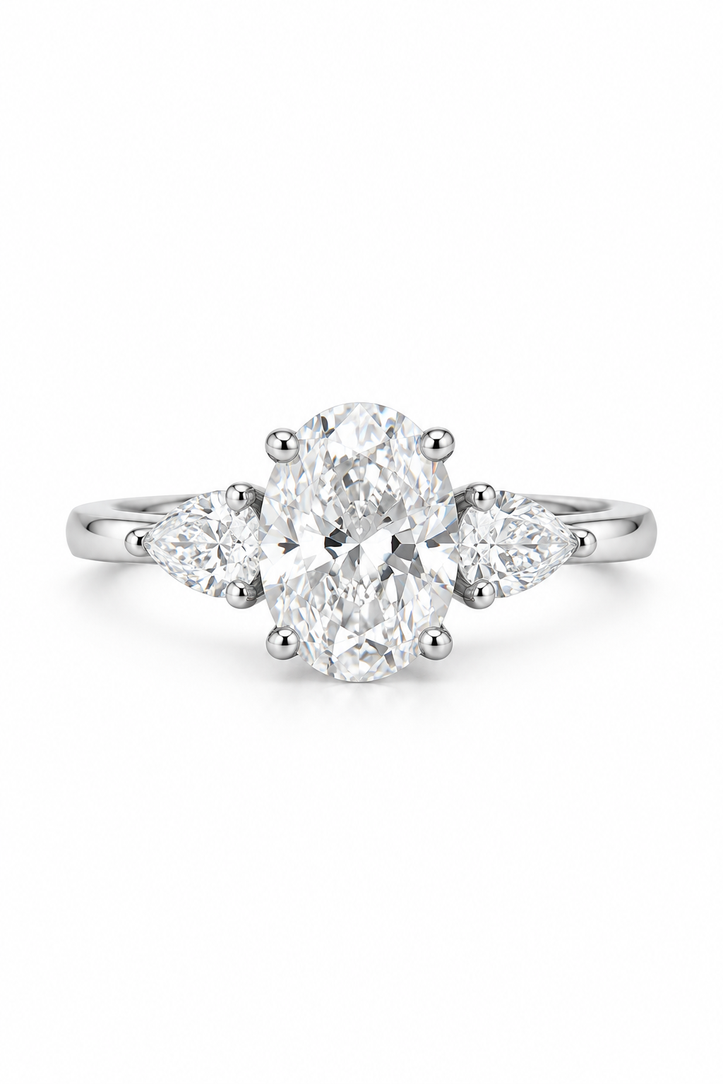 Oval-Cut Diamond Ring With Pear Side Stones