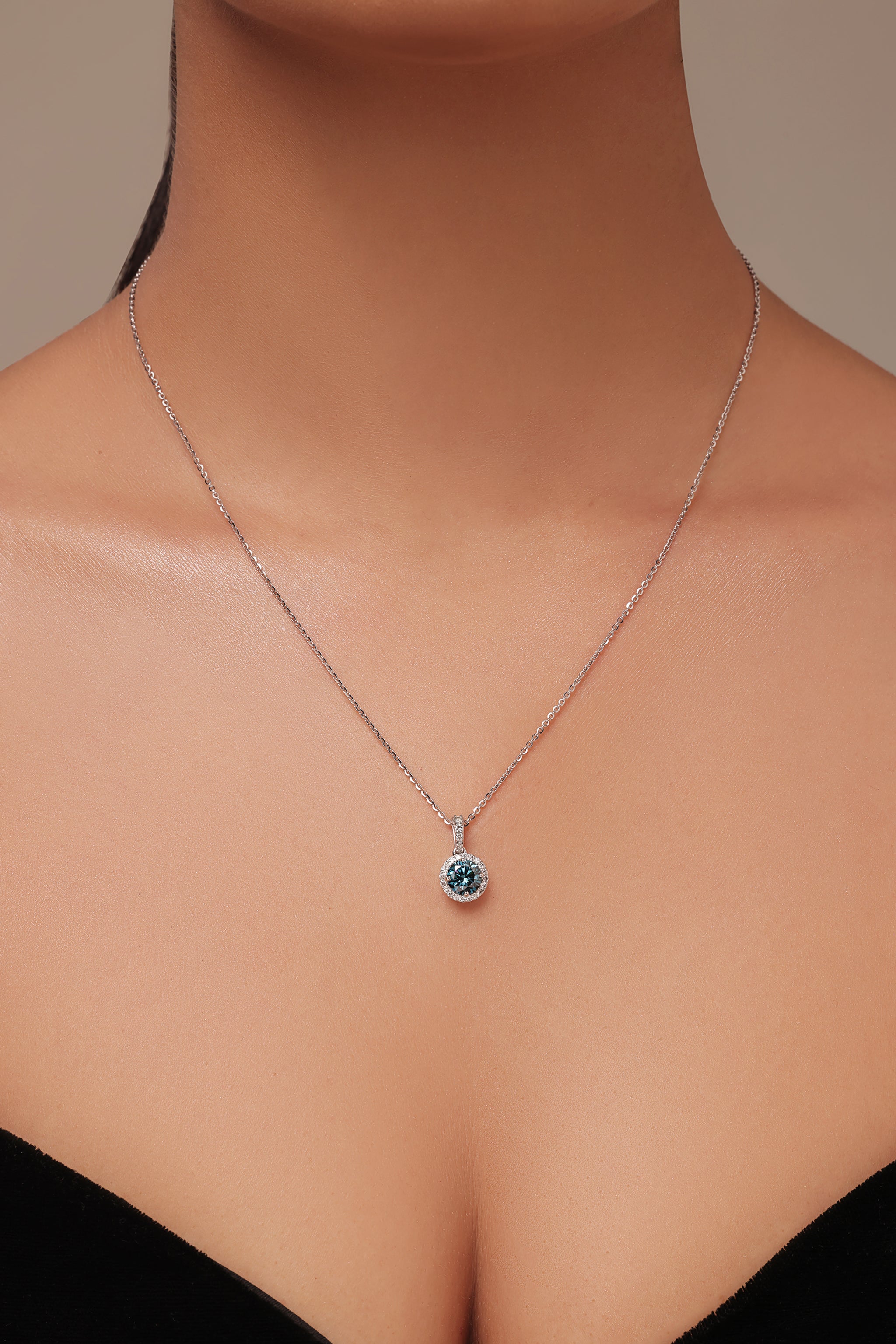 Blue diamond halo pendant