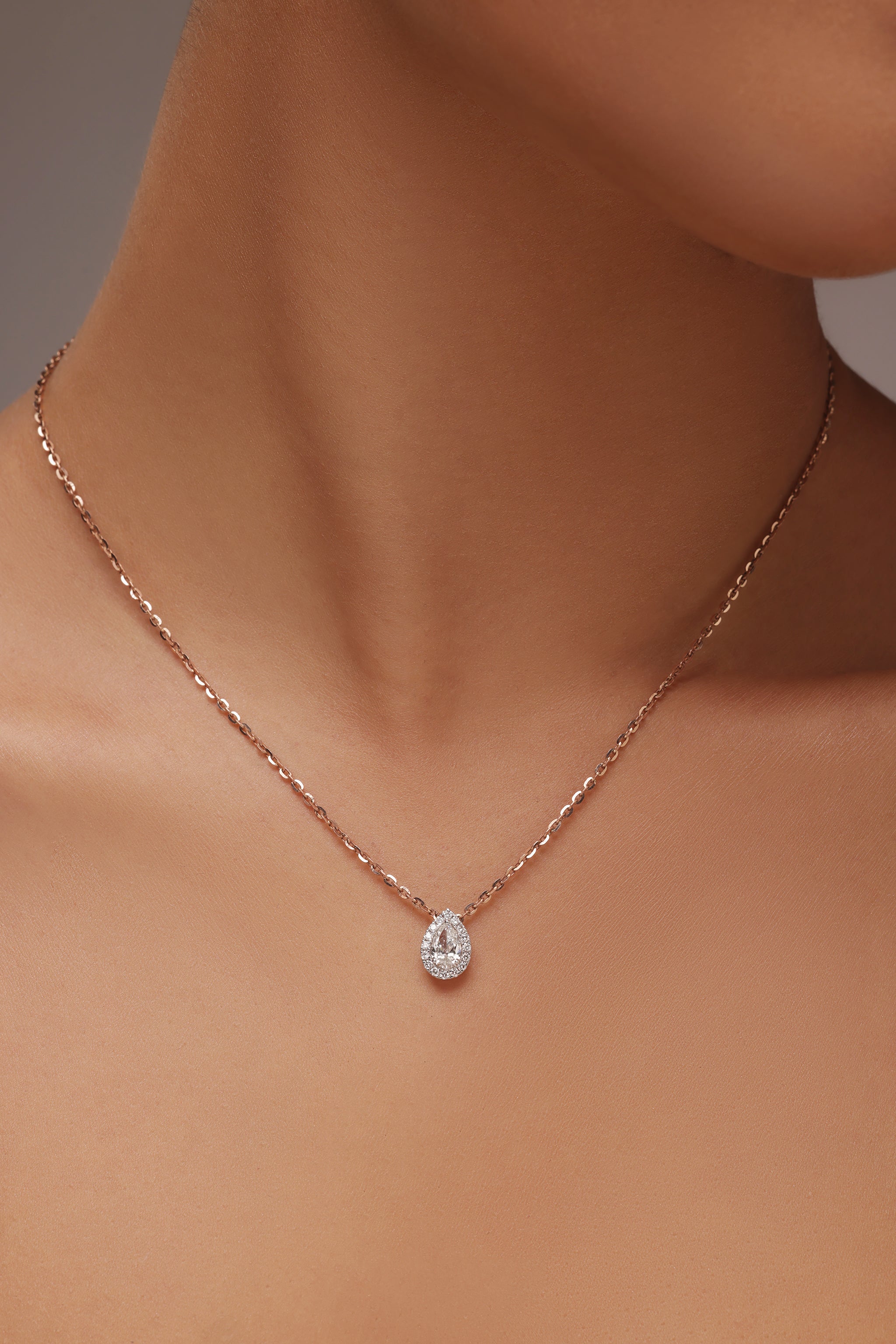 Pear Halo Diamond Earring