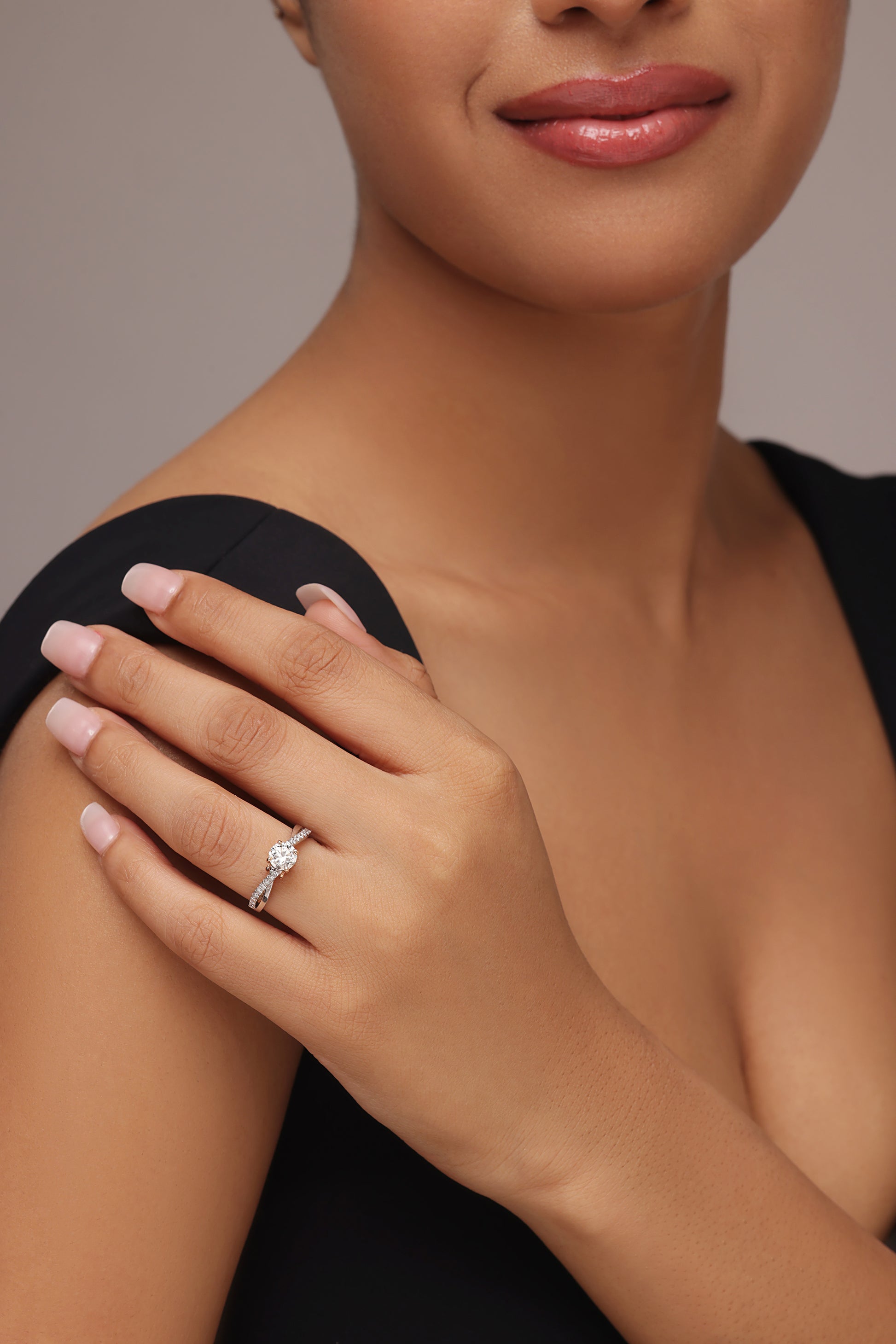 Round Diamond Ring with Tapered Bow Shoulders