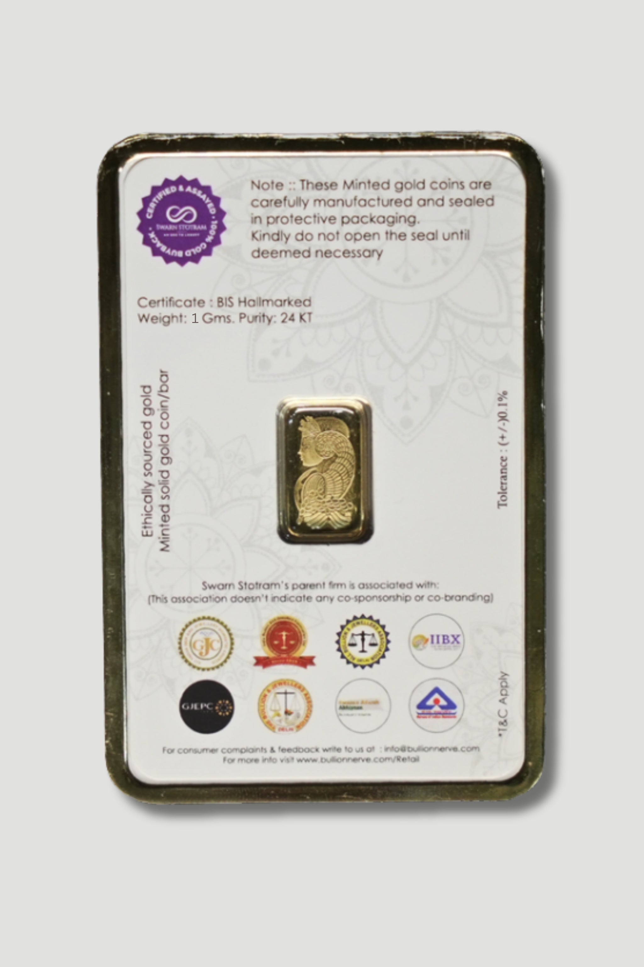 A packaged 1 gram, 24 Karat, BIS Hallmarked minted solid gold bar with an engraved design of a deity's profile. The packaging includes warnings not to open the seal, a note on ethical sourcing, and details about the manufacturer Swarn Satram and Xazina.