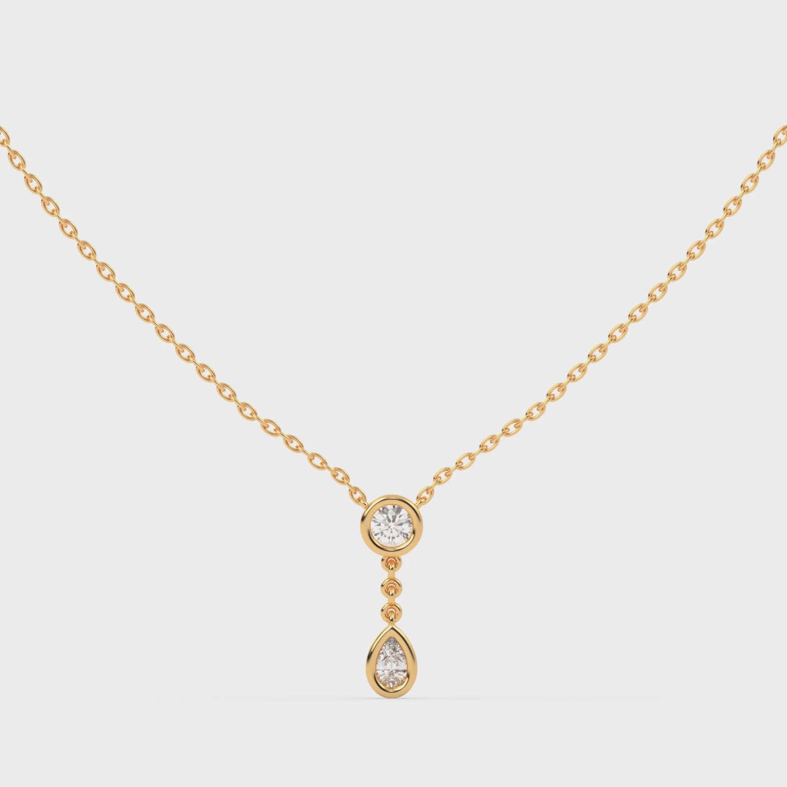 Load video: The bezel round and pear diamond pendant with Lab Grown Diamond Necklace 