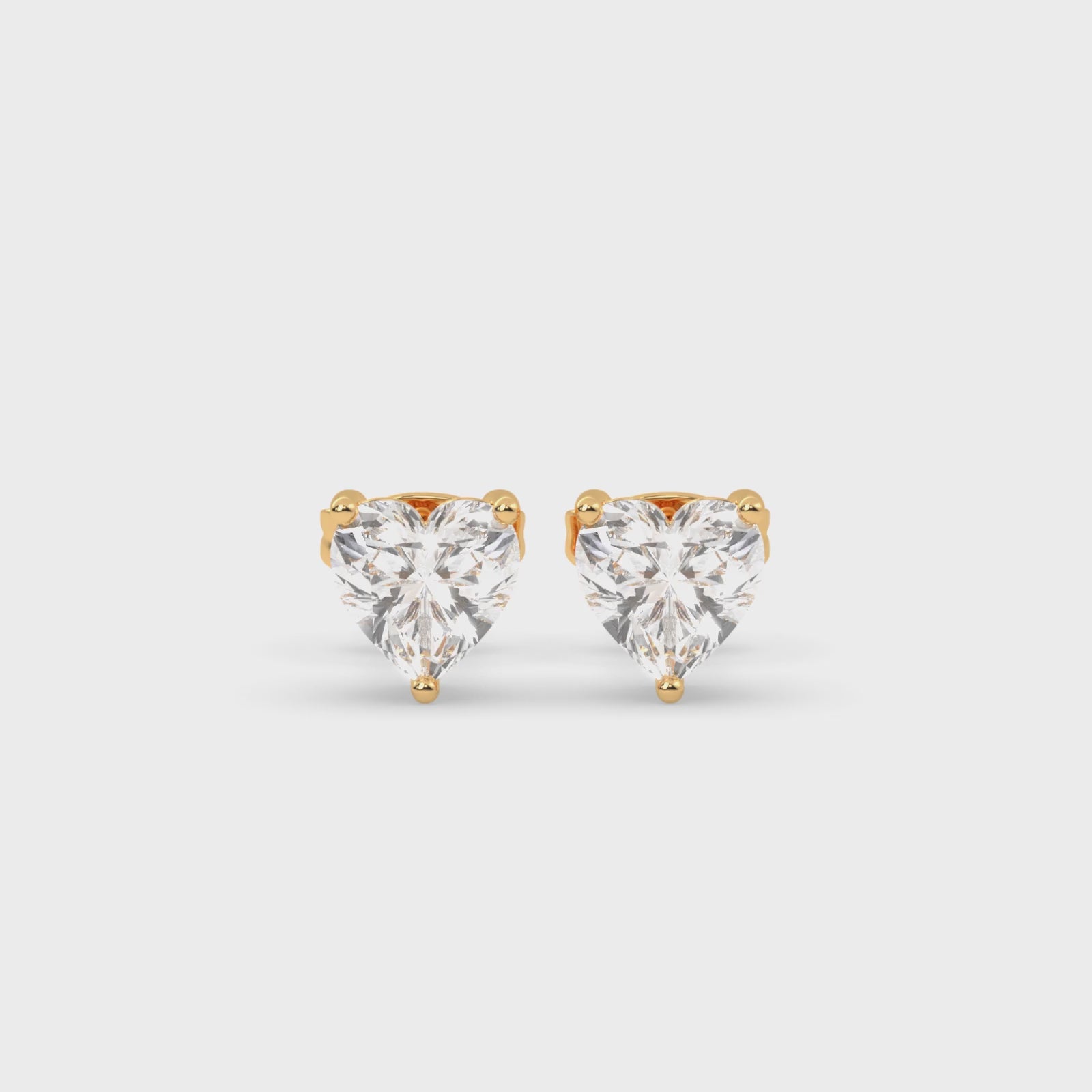 Load video: HEART SOLITAIRE EARRINGS
